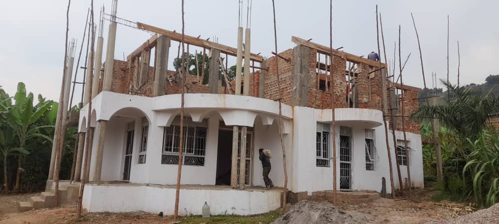 Two-storey residential building delivered by CHI-IBANDA under construction in Uganda.